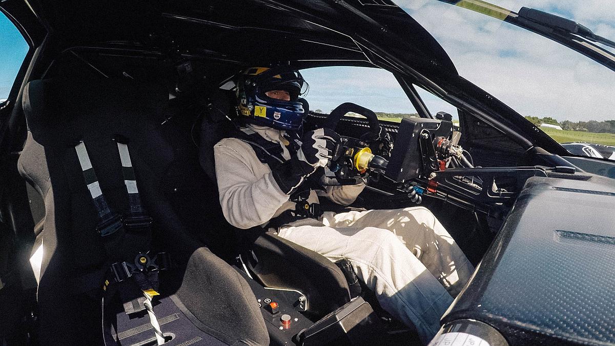 Brabham BT62 with David Brabham Testing on circuit