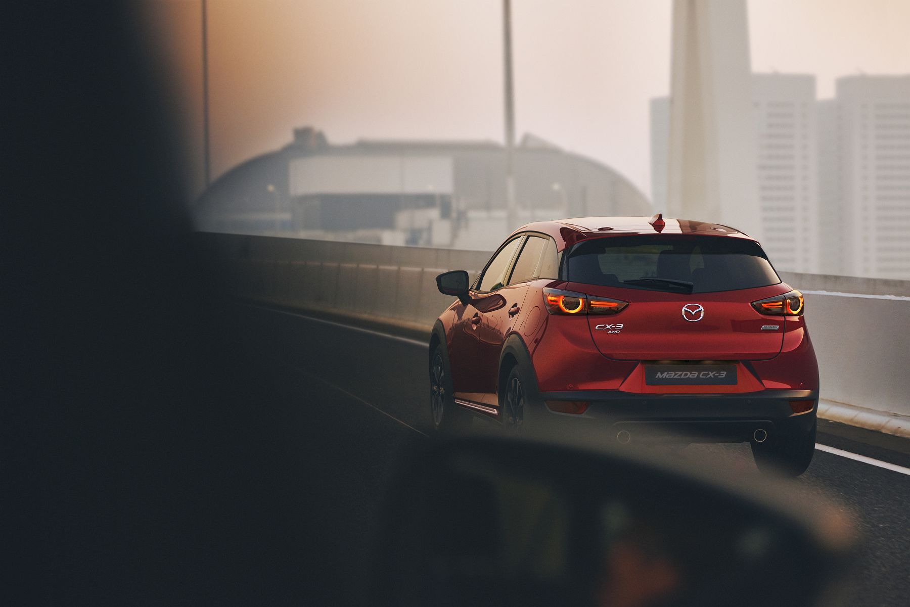 18_2018_MAZDA_CX-3_ACTION_REAR