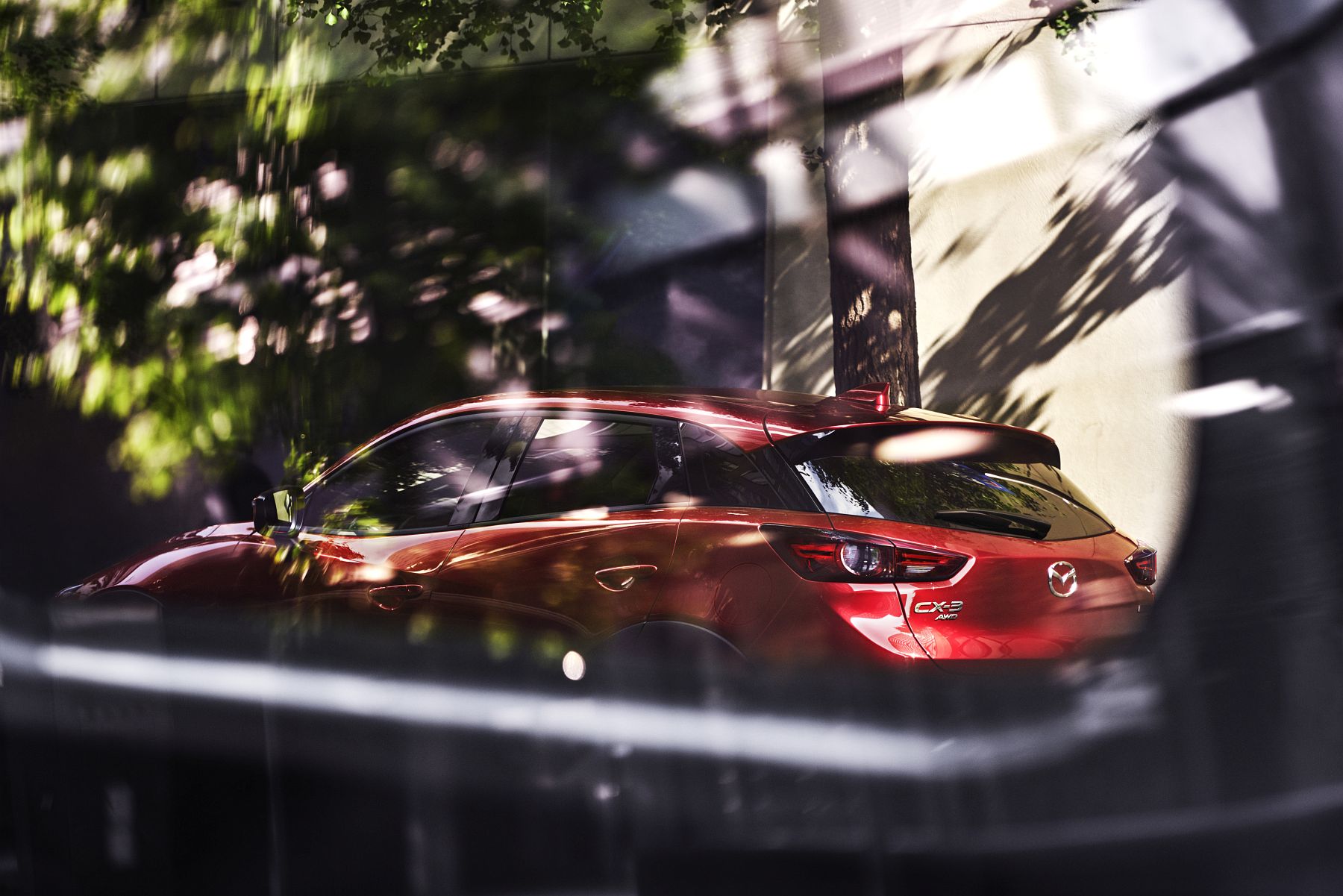 19_2018_MAZDA_CX-3_ACTION_REAR