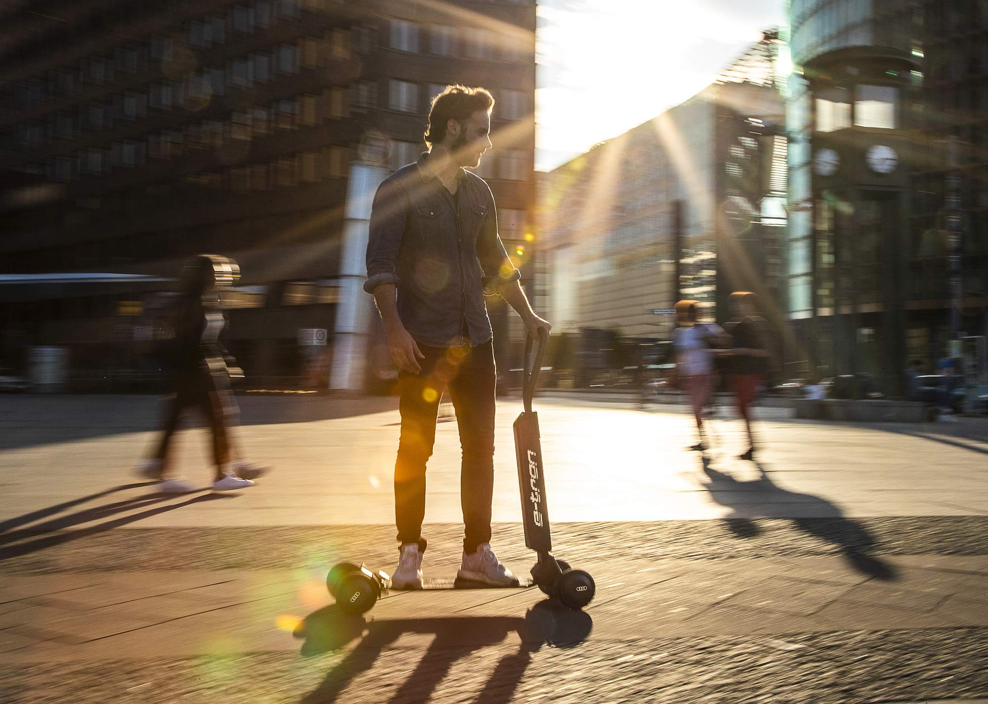 Audi combines e-scooter with skateboard