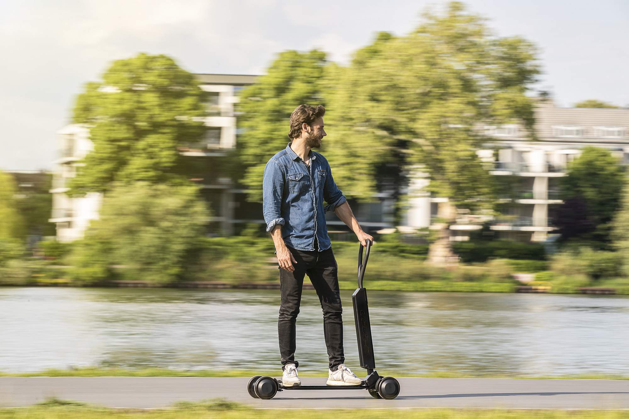 Audi combines e-scooter with skateboard