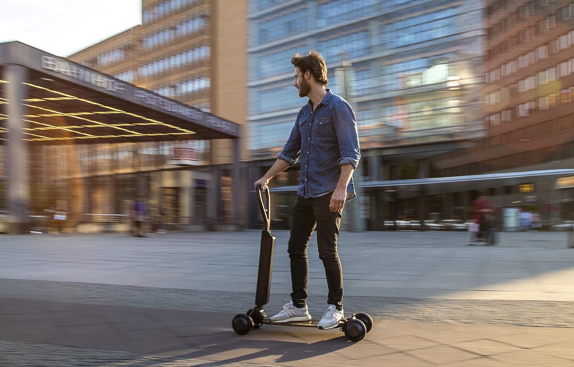 Audi combines e-scooter with skateboard