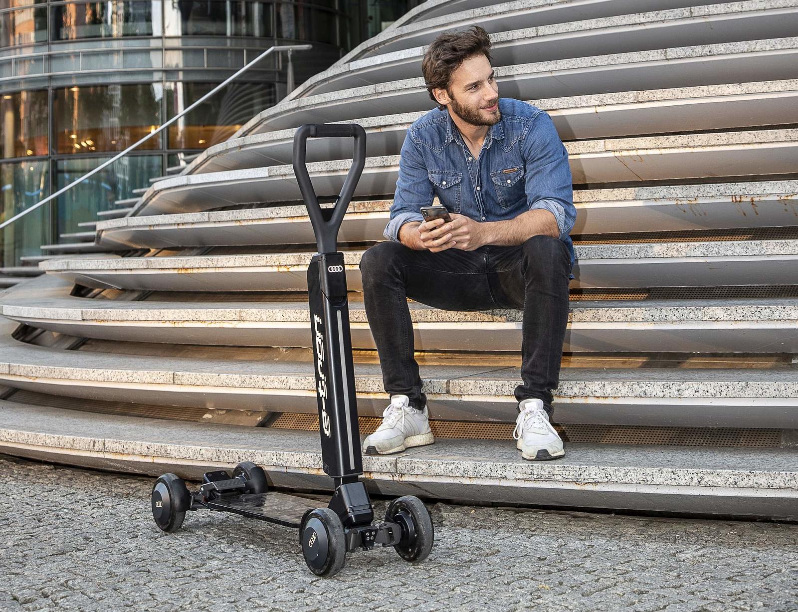 Audi combines e-scooter with skateboard
