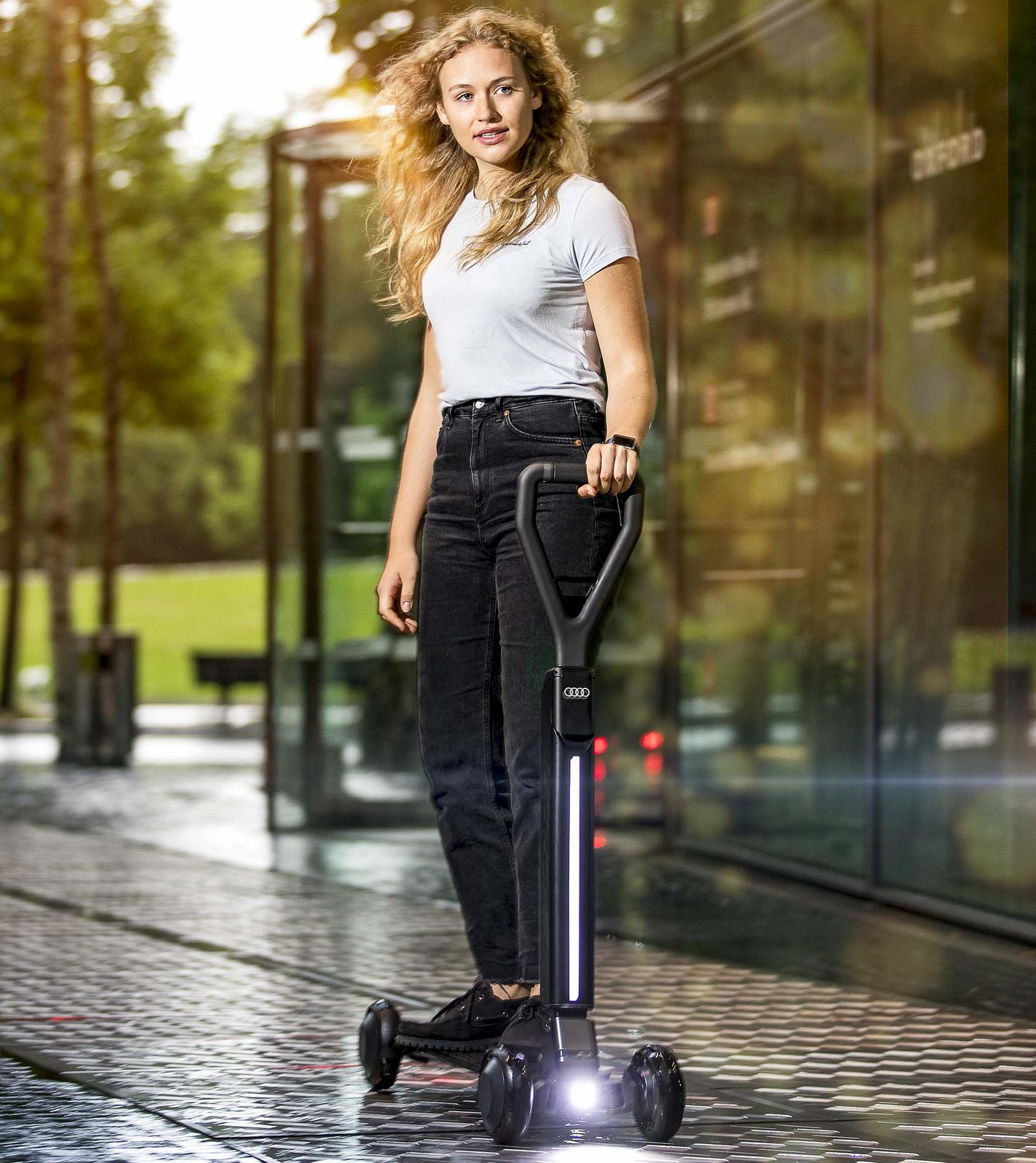 Audi combines e-scooter with skateboard
