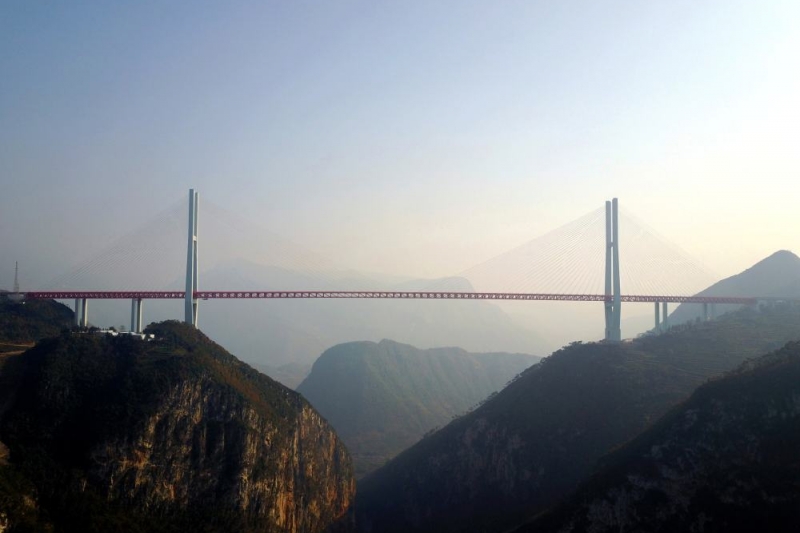 An aerial view shows the Beipanjiang Bridge, connecting Guizhou and Yunnan provinces, which is reported as world’s highest bridge according to local media