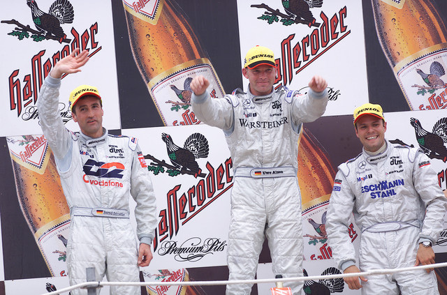 Caption orig.: DTM Norisring, 8.Juli 2001. Siegerehrung: Uwe Alzen (Warsteiner AMG Mercedes), zweiter – Bernd Schneider (D2 AMG Mercedes) – dritter: Marcel Tiemann (Eschmann AMG Mercedes)