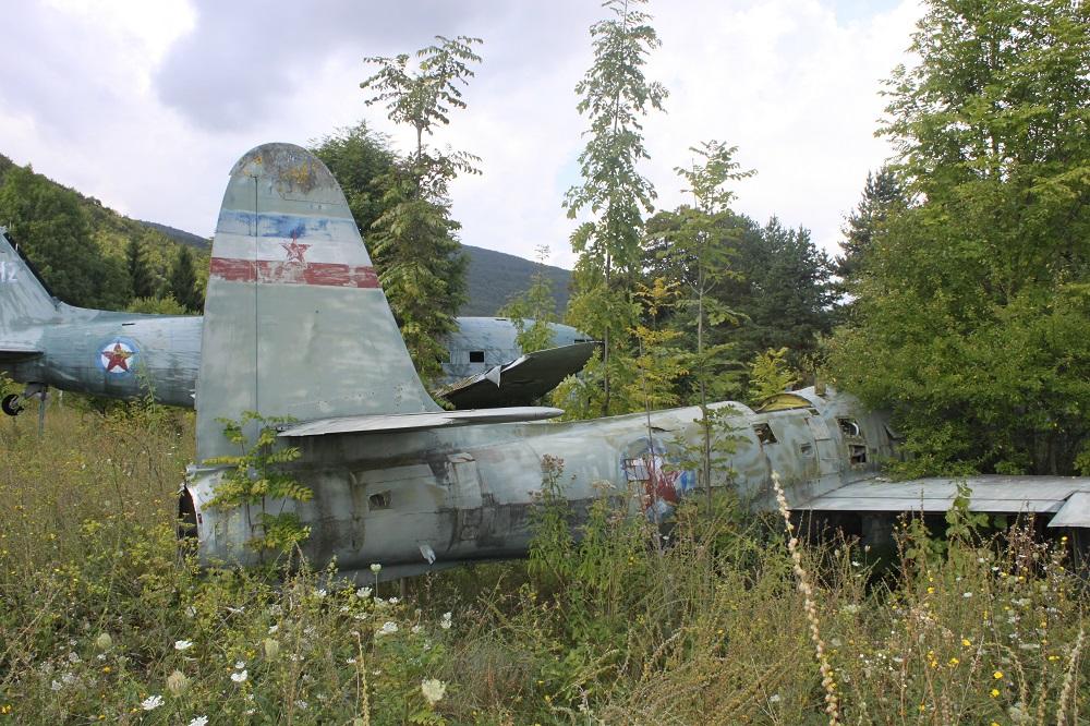 An_F-84G_and_an_RF-84G_are_still_dumped_at_the_entrance_to_the_former_Željava_Airbase_in_Croatia_(4970813931)