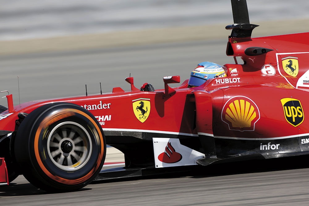 fernando-alonso-ferrari-on-track-with-p-zero-orange-hard-tyres