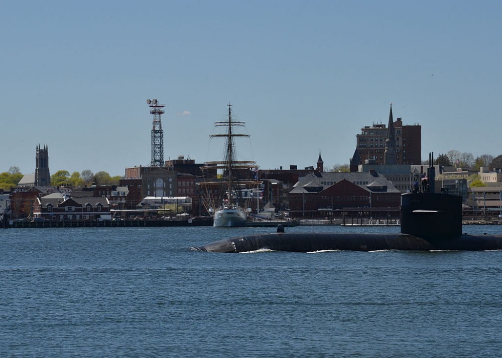 The_attack_submarine_USS_Dallas_(SSN_700),_right,_passes_by_the_cutter_USCGC_Eagle_(WIX_327),_center,_in_Groton,_Conn.,_May_3,_2013_130503-N-TN558-187
