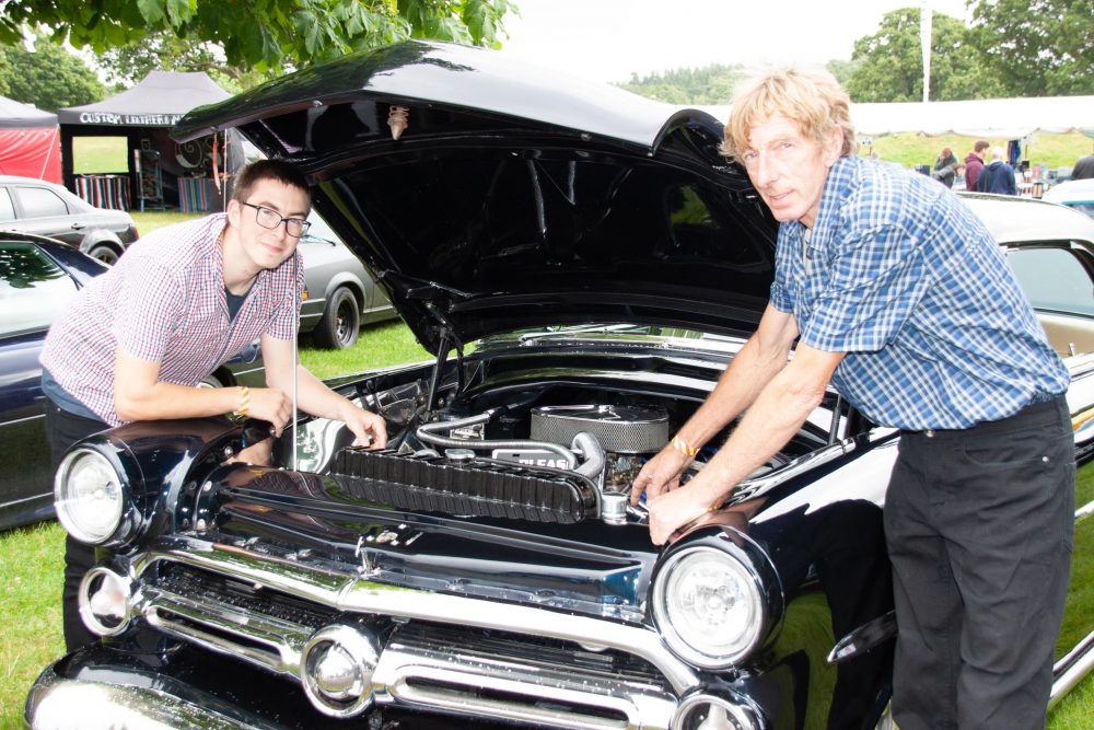 Son CJ Burroughs and father Chris Burroughs at Hot Rod and Cutom Drive-in Day
