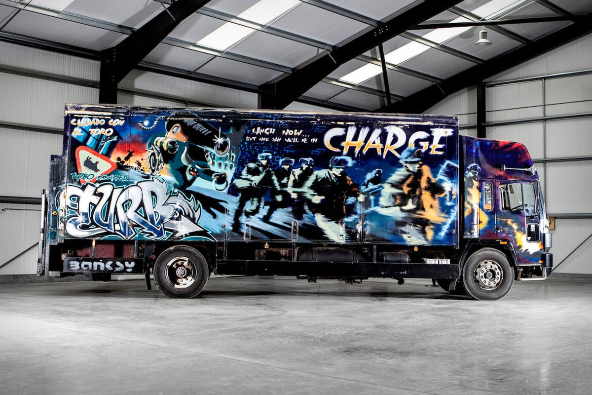 Banksy-Turbo-Zone-Truck_-Laugh-Now-But-One-Day-We’ll-Be-in-Charge-2000_-Estimate-£1000000-1500000