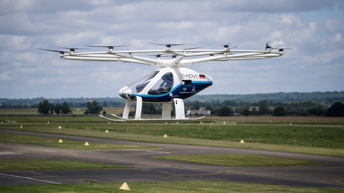 Crewed_Volocopter_eVTOL_flying_at_Aerodrome_of_Saint-Cyr-l-_cole